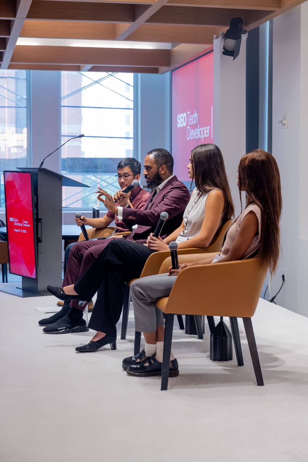 Jean speaking at a panel